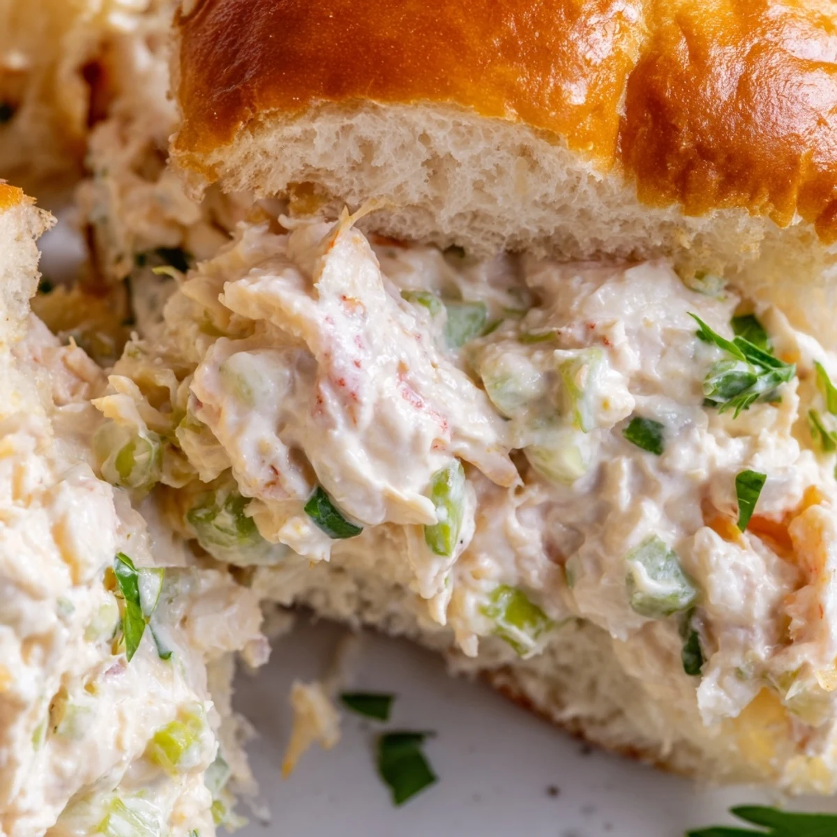 New England style garlic butter lobster rolls loaded with tender meat and zesty lemon