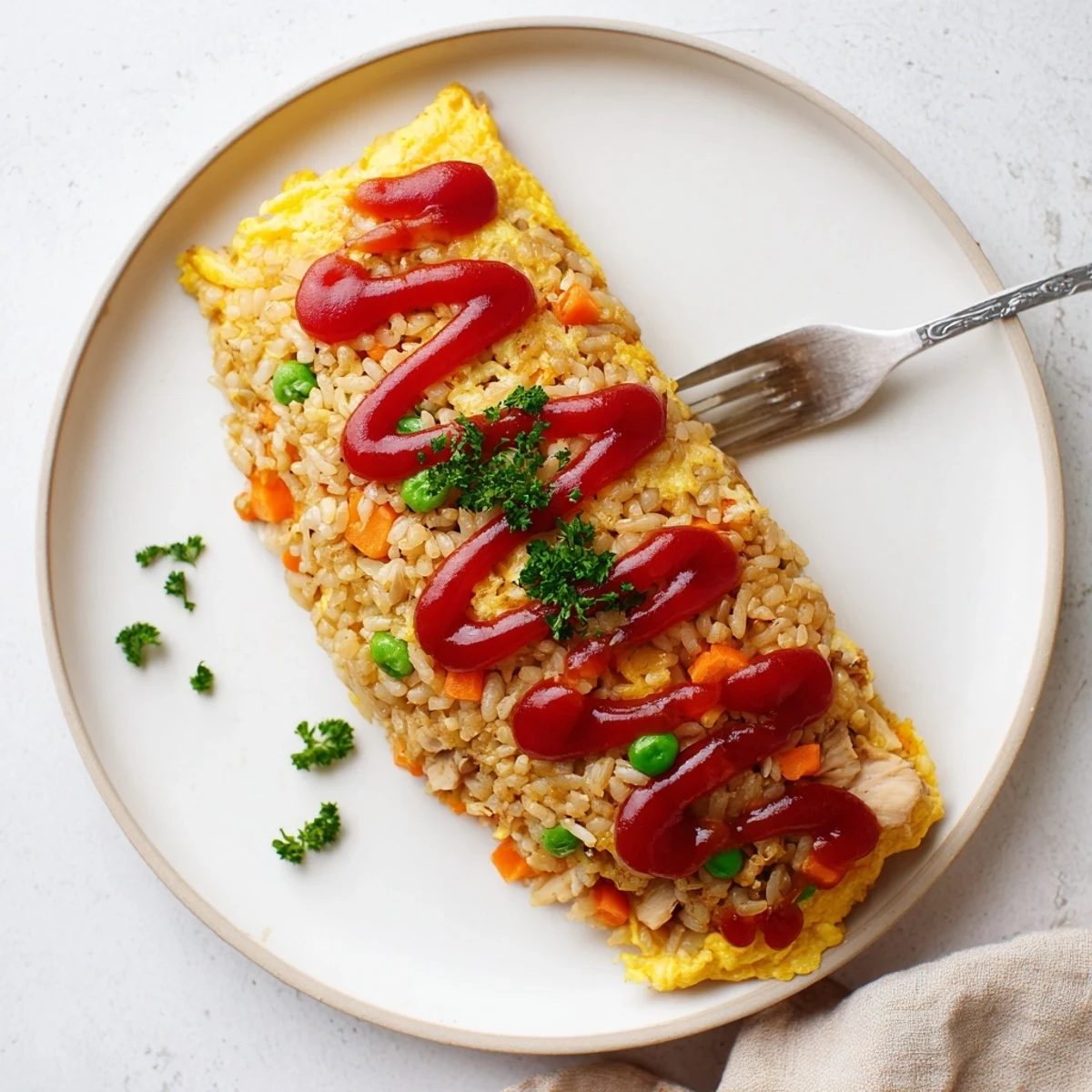 Comforting omurice dish showing soft yellow egg envelope hiding colorful vegetable fried rice mound garnished with parsley