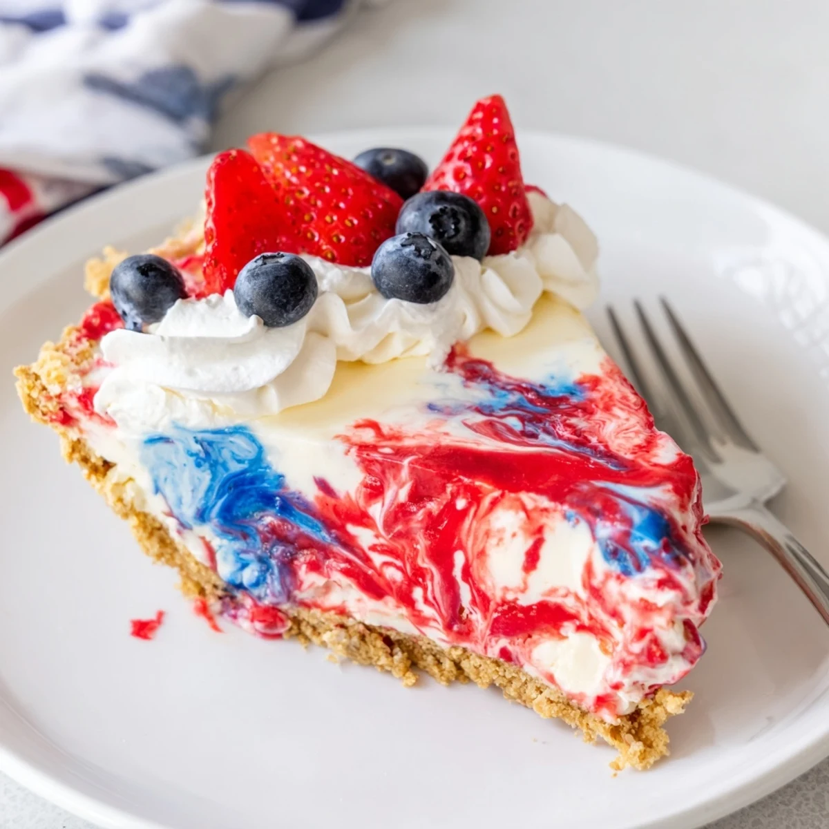 Chilled Patriotic Red White And Blue Swirl Pie showing vibrant marbled cream swirls  