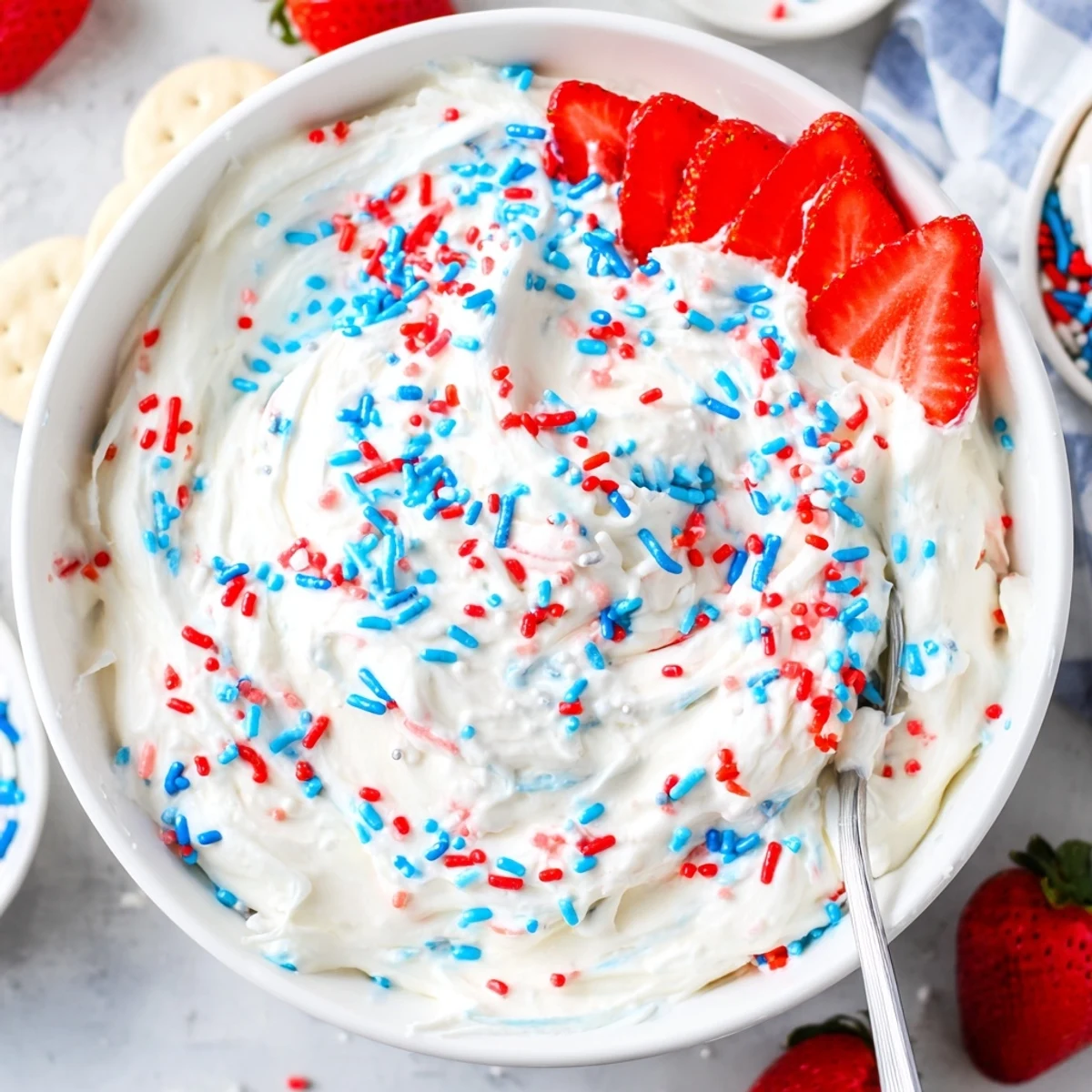 Red White And Blue Funfetti Dip studded with colorful sprinkles, ready for dipping