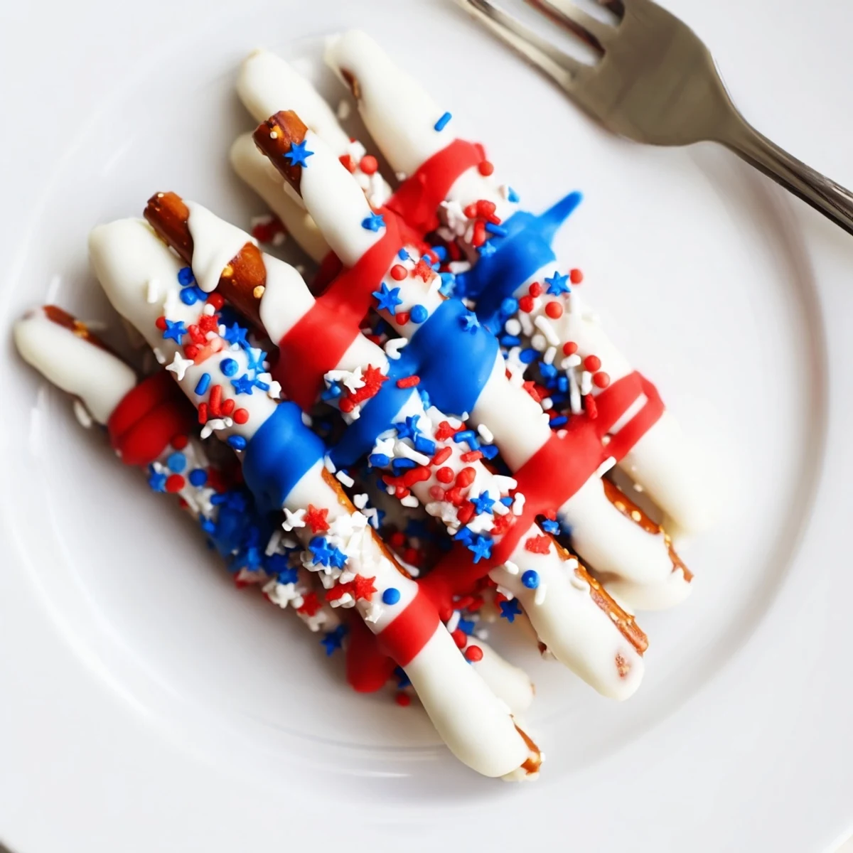 Pack Patriotic Pretzel Rods in cellophane for Fourth of July party favors