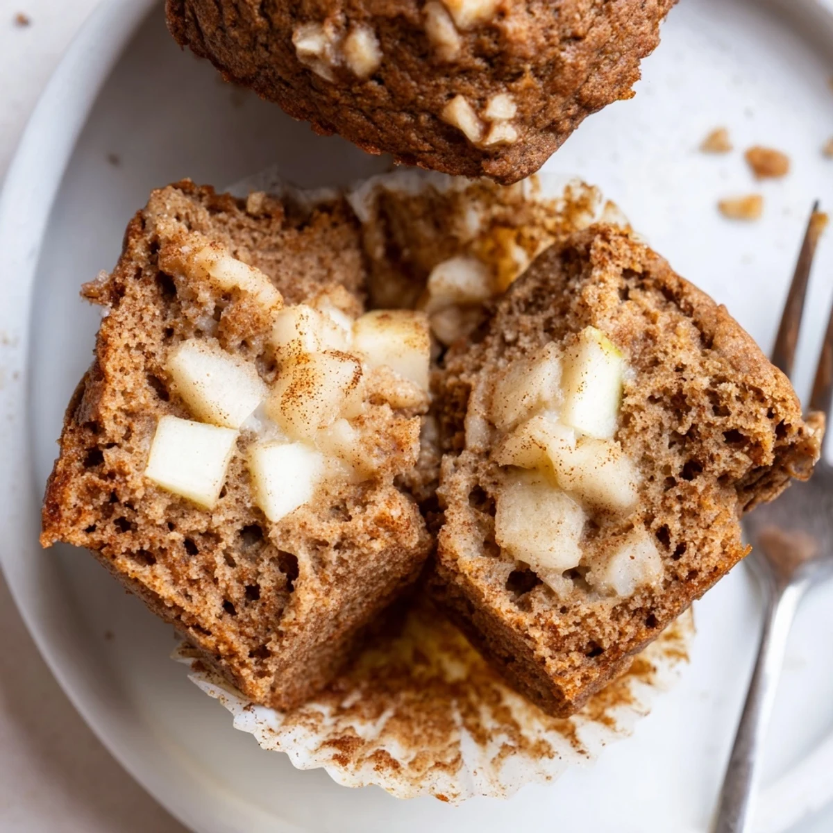 Healthy Apple Cinnamon Greek Yogurt Muffins steaming on a rack, apples and cinnamon aroma